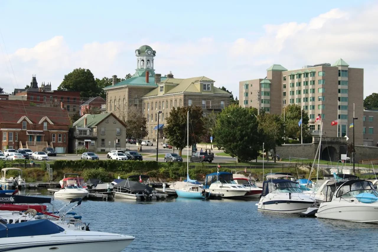 Fredericton, New Brunswick harbour with heritage buildings — cobbler and shoe repair service area