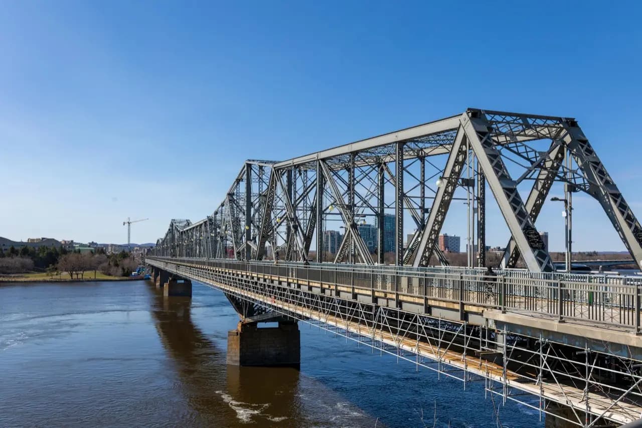Alexandra Bridge connecting Gatineau, Quebec to Ottawa — cobbler and shoe repair service area