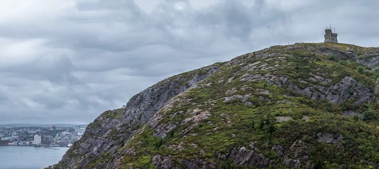 St. John's, Newfoundland Signal Hill with Cabot Tower and harbour — cobbler and shoe repair service area